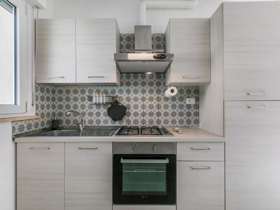 Kitchen, Kitchen Appliance, Countertop, Major Appliance, Cabinetry, Kitchen Stove, Kitchen Sink, Home Appliance, Stove, Sink