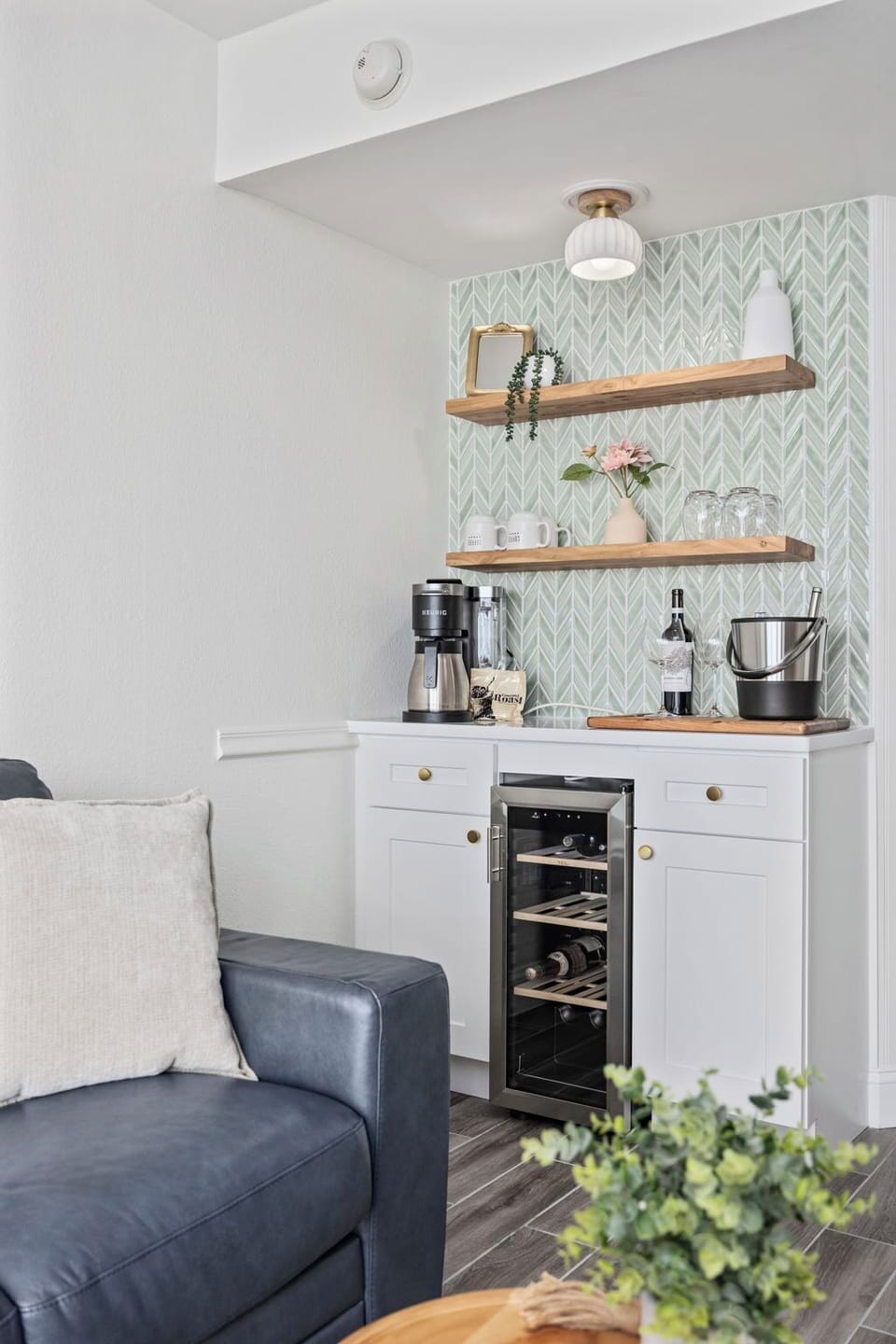 Enjoy fresh coffee or unwind with a chilled bottle from the wine fridge. 