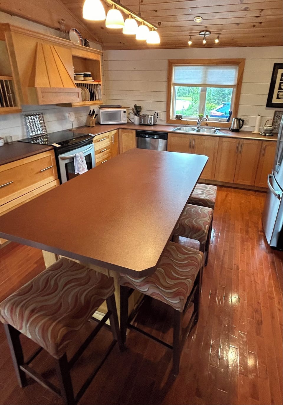 Kitchen Island seats five. 