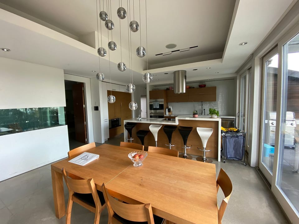 Spacious dining area for family dinners or game nights.