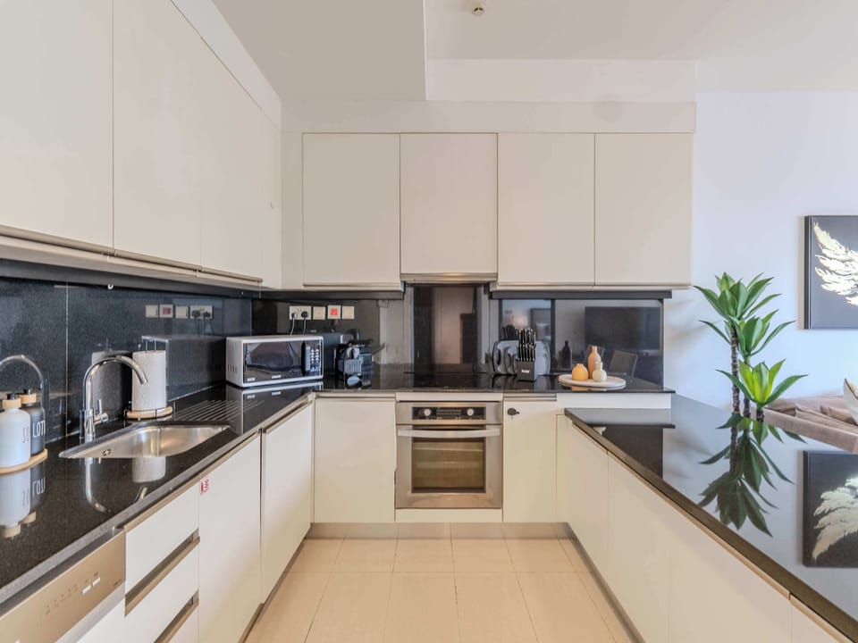 Modern appliances and sleek finishes await your culinary adventures!