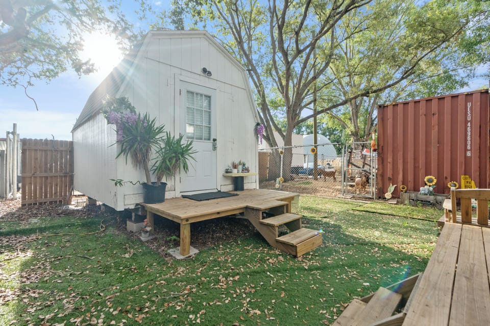 Charming and welcoming exterior with a cozy vibe, perfect for a relaxing stay.