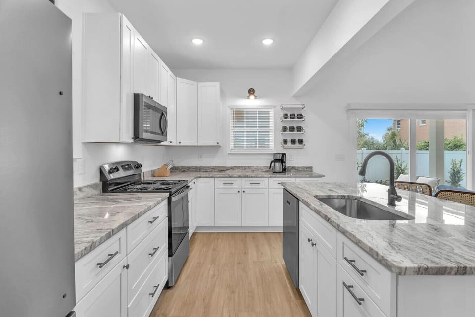 Spacious Kitchen with Island Perfect for Family Cooking