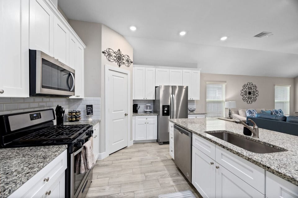 Fully equipped kitchen with ample counter space—great for cooking and group stays