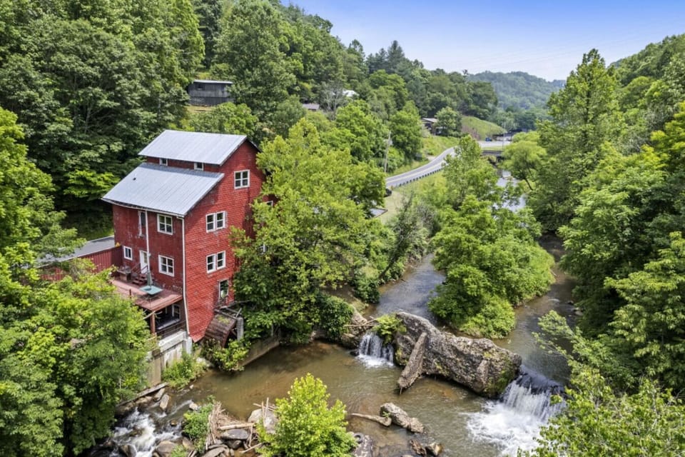 Situated along 950 feet of Cane Creek, enjoy your own private waterfall and access to the river.