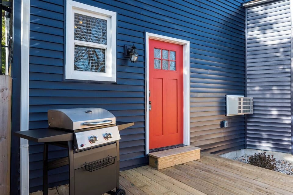 This exterior space is communal, and will soon feature patio furniture!  Stop in, enjoy, and socialize!  Make use of the grill!