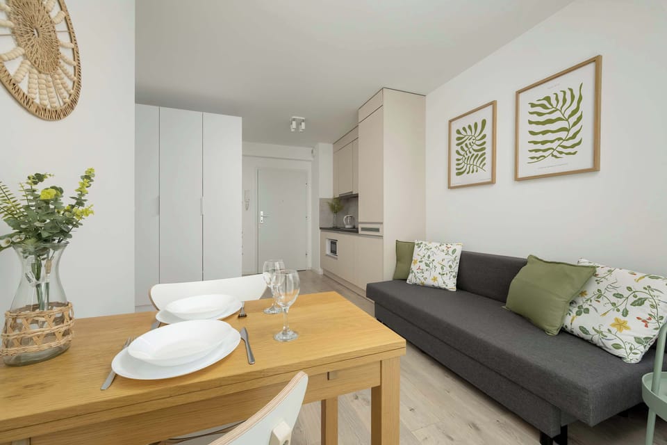 The room has a capacious white wardrobe which provides plenty of storage space.