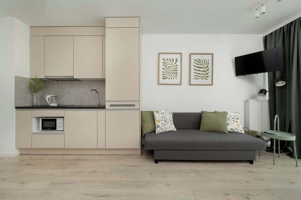 The functional interior combines the convenience of the living area with the practical function of the kitchenette.