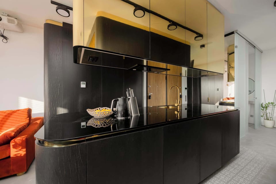 The fully equipped kitchenette includes everything you need for a home-cooked meal.