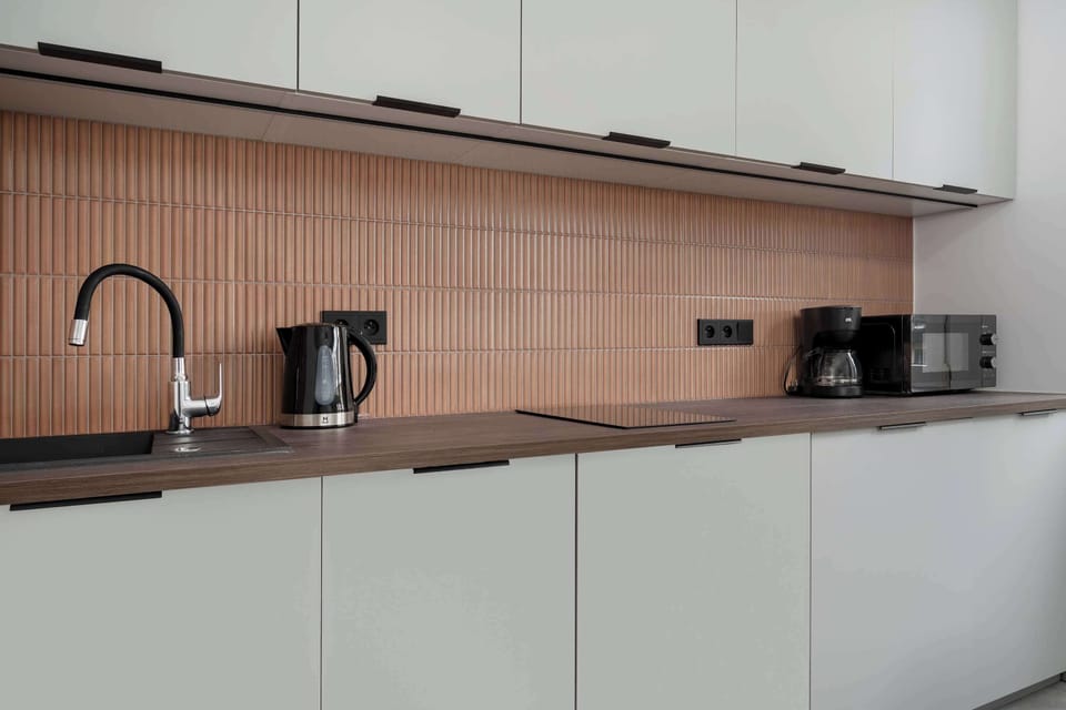 The kitchen's modern appliances make meal preparation easy.