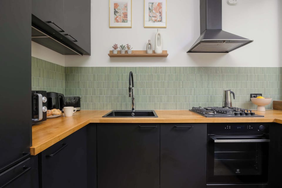Cook and dine in style with the modern kitchenette and dining area.