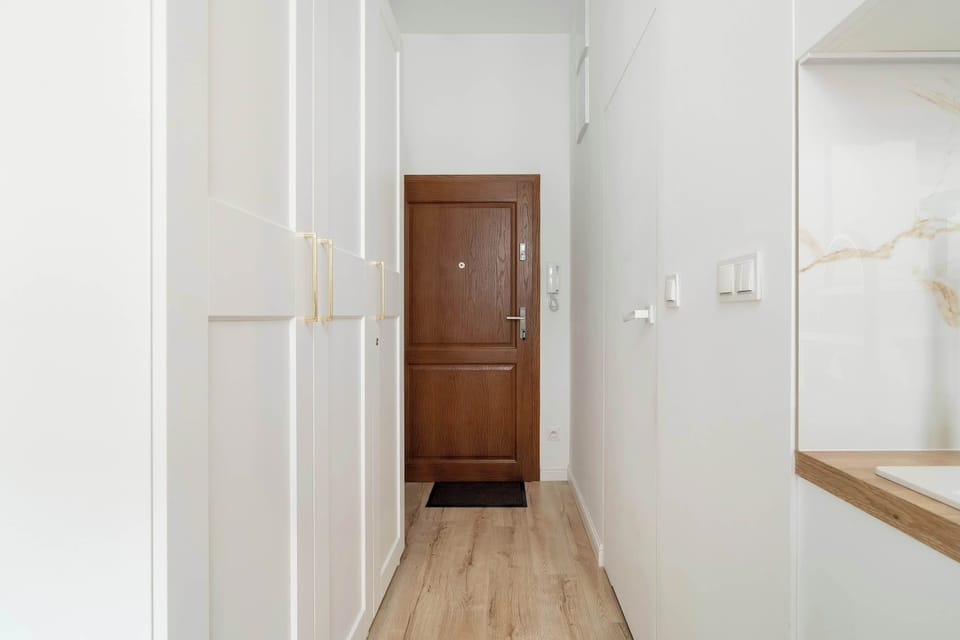 Hallway with a closet.