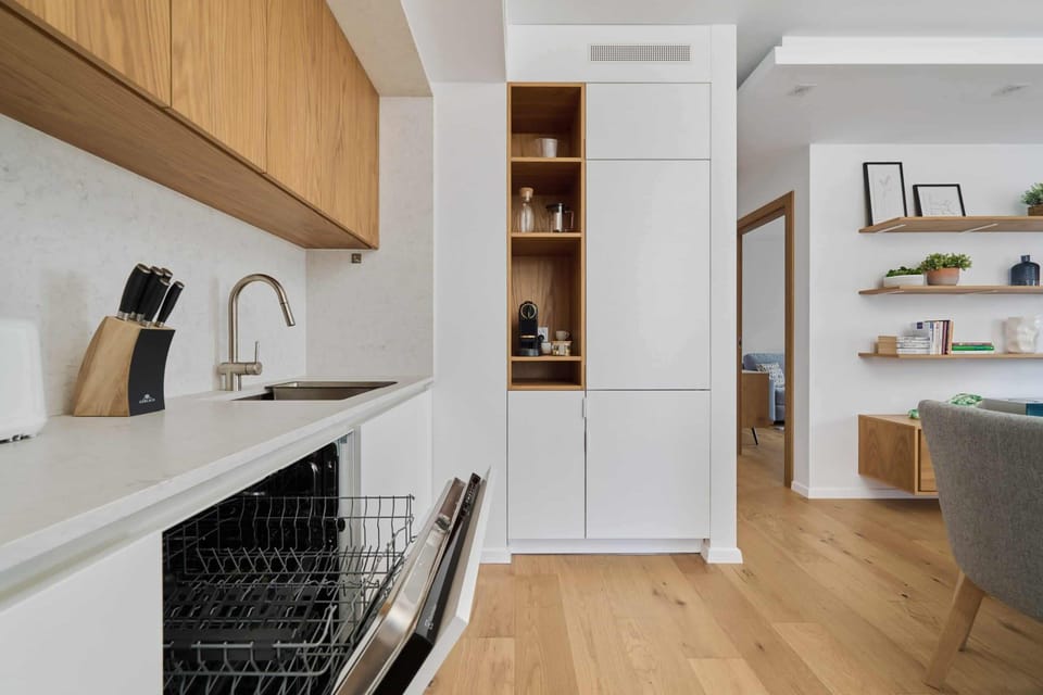 Kitchenette with a dishwasher.