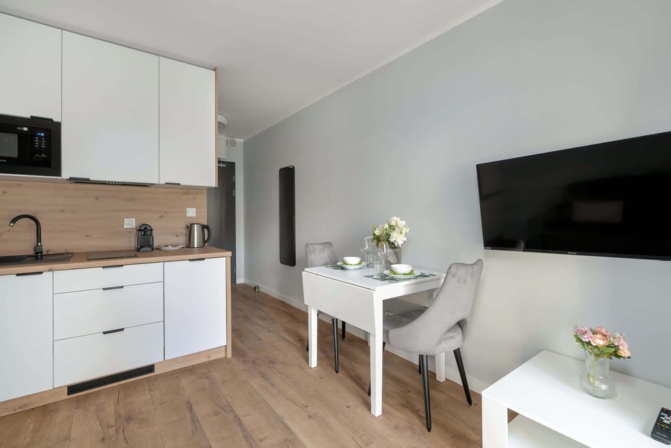 Practical kitchenette next to the dining area.