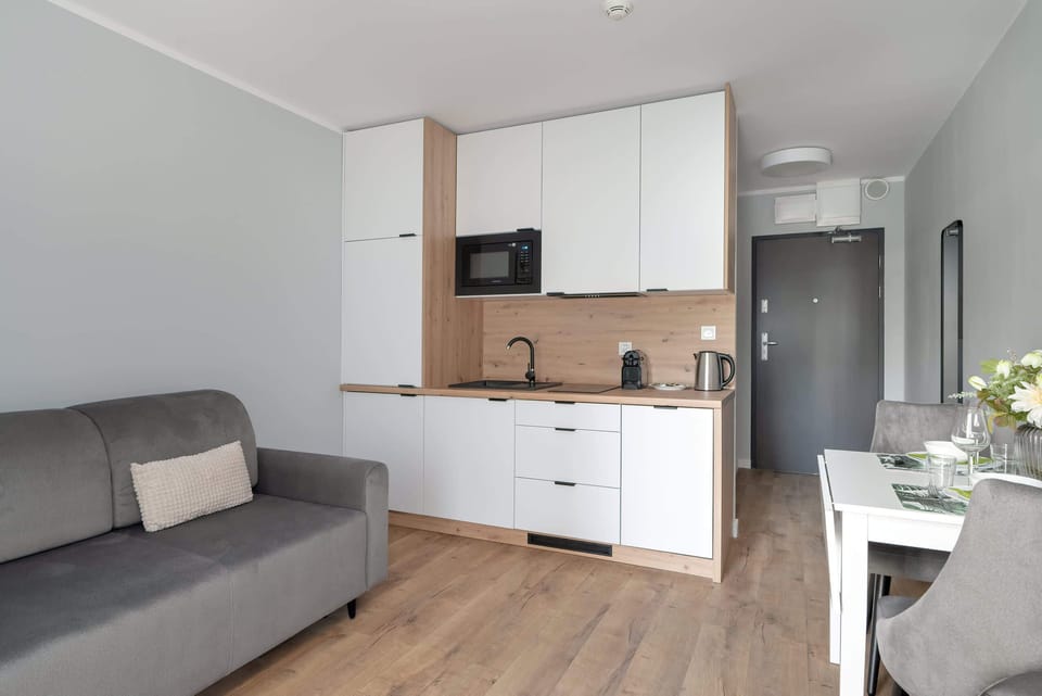 Practical kitchenette with modern appliances.