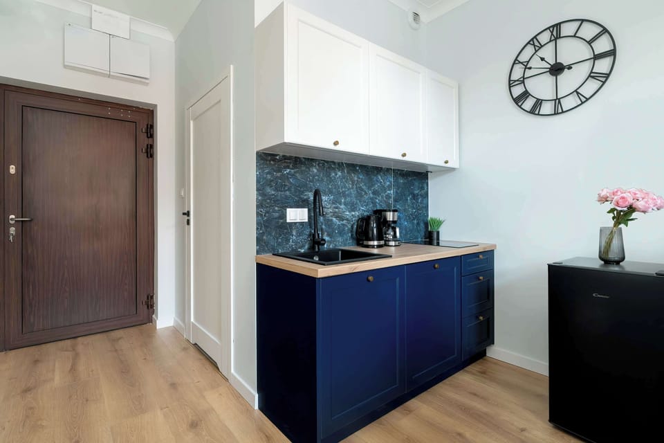 Modern kitchenette with full equipment.