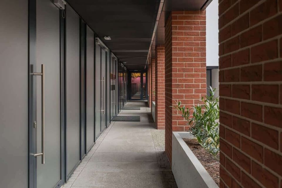 Stylish corridor leading to the apartment. 