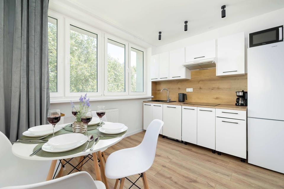Cook and dine in style with the modern kitchenette and dining area.