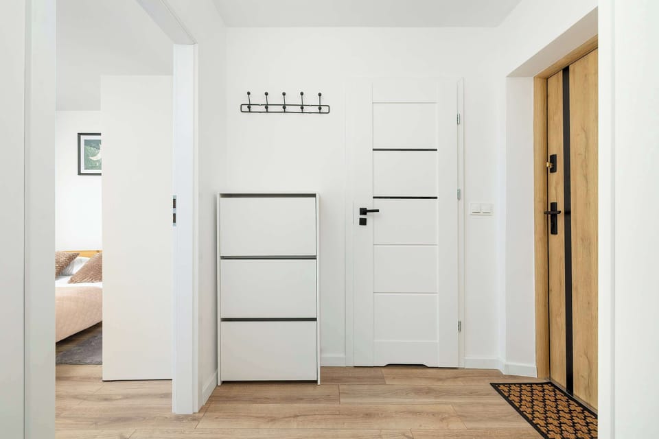 The bedroom's elegant decor creates a serene and restful environment.