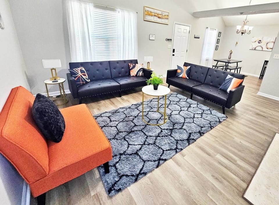 Kick back, relax in this comfy living room, and watch your favorite movie or show on the 55-inch flat-screen smart TV. Both sofas are sleeper beds!