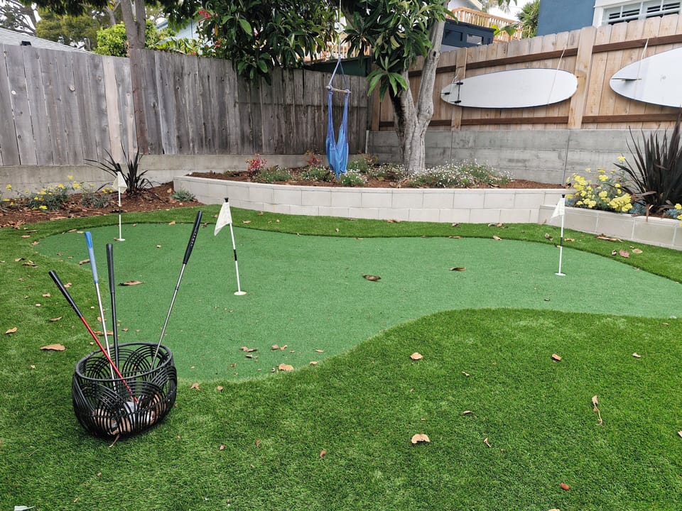 putting green with night lights, kayak/surfboard/SUP available to borrow