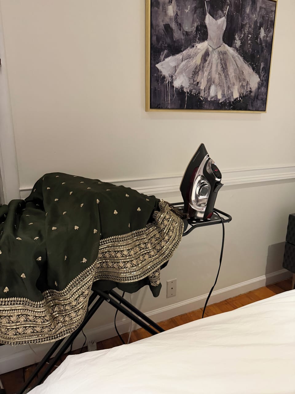 Ironing board and iron and steamer provided to help get ready as a wedding guest