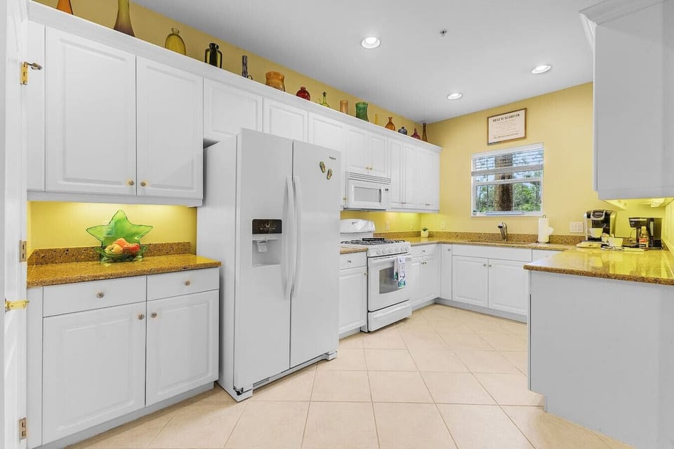 This spacious kitchen has it all - a clean look
