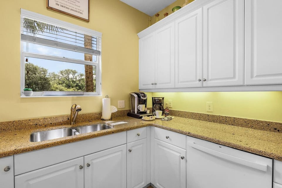 The view from the kitchen is serene and beautiful