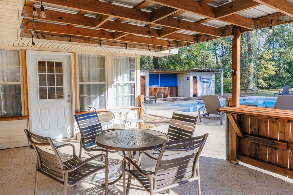 Covered outdoor seating area for casual meals or relaxing outside.