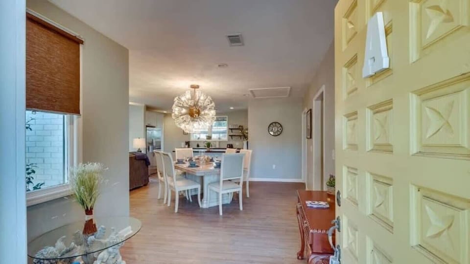 Open floor plan connecting the dining and living areas.