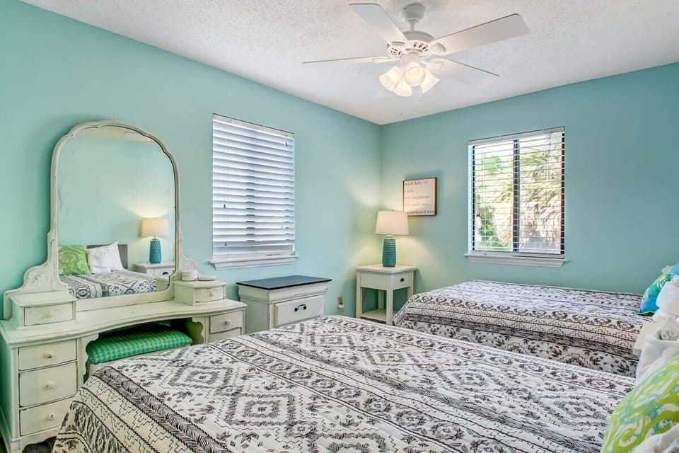 Thoughtfully designed bedroom accommodating multiple guests comfortably.