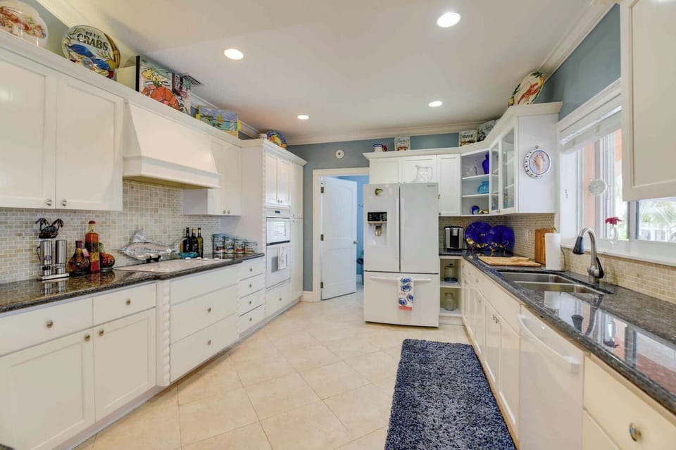 Upstairs Kitchen fully furnished with everything you need to prepare your meals