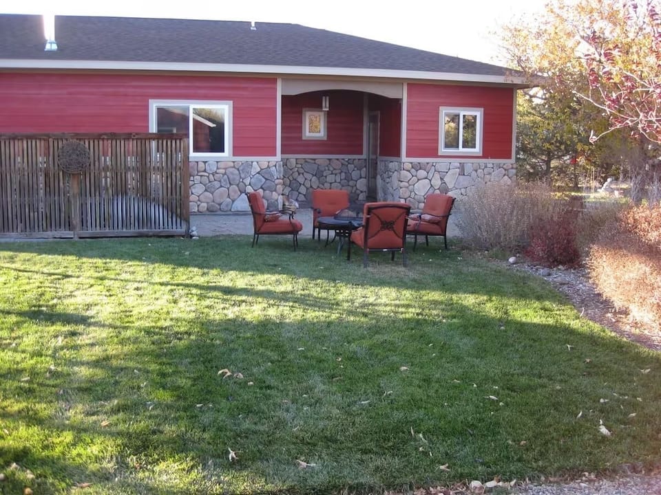 Outdoor breakfast nook off the kitchen, shared yard.
