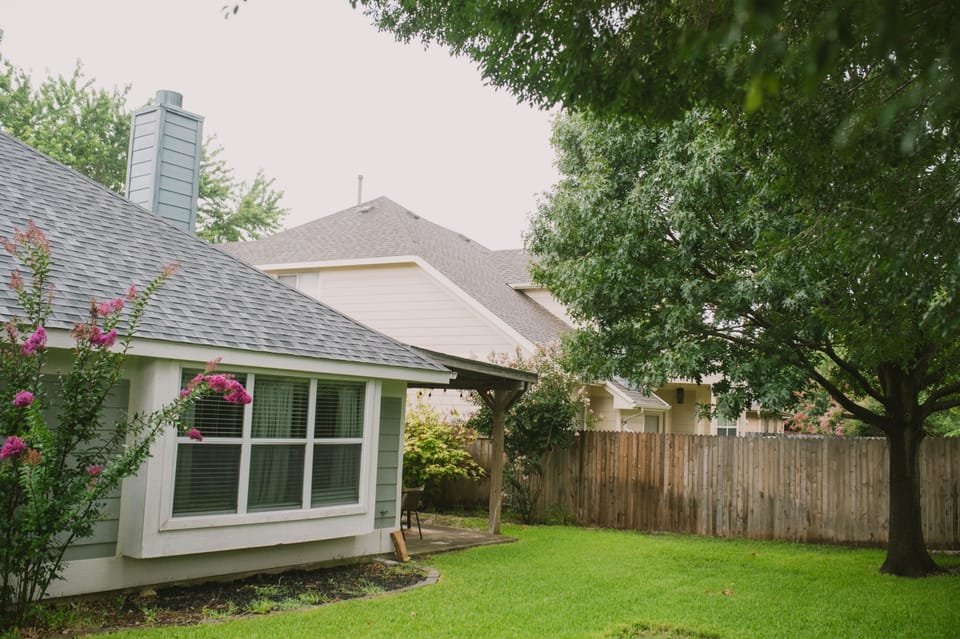 Enjoy the expansive and private backyard, perfect for outdoor activities, relaxation under the shade of the tree, or simply enjoying the fresh air.