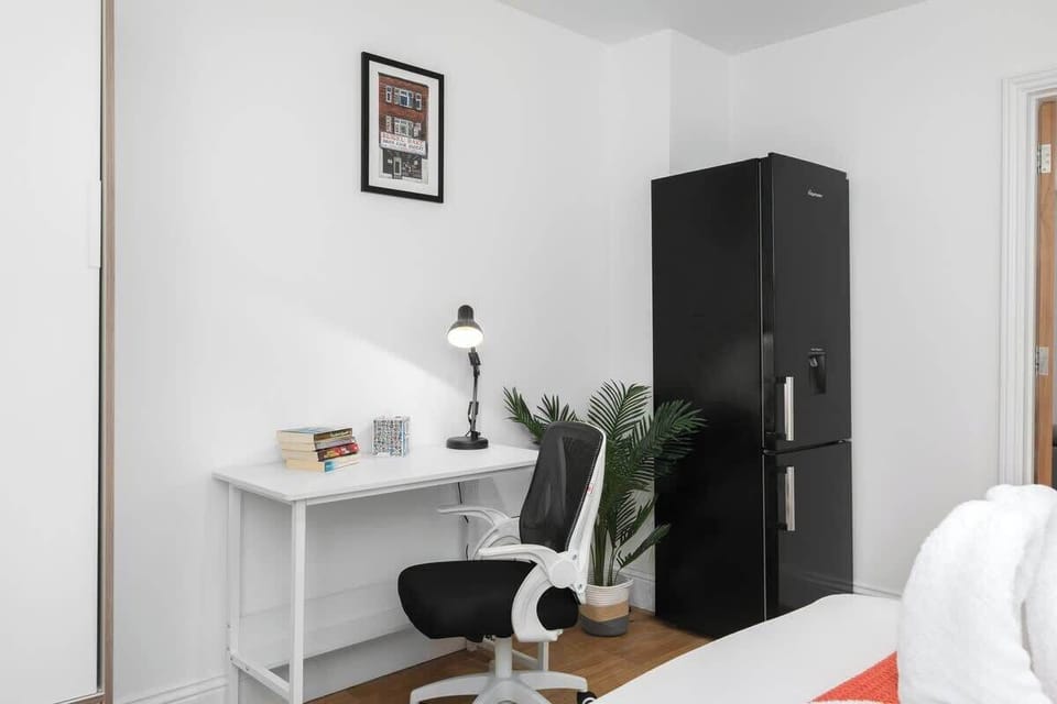 Stylish bedroom with a dedicated, comfortable work space