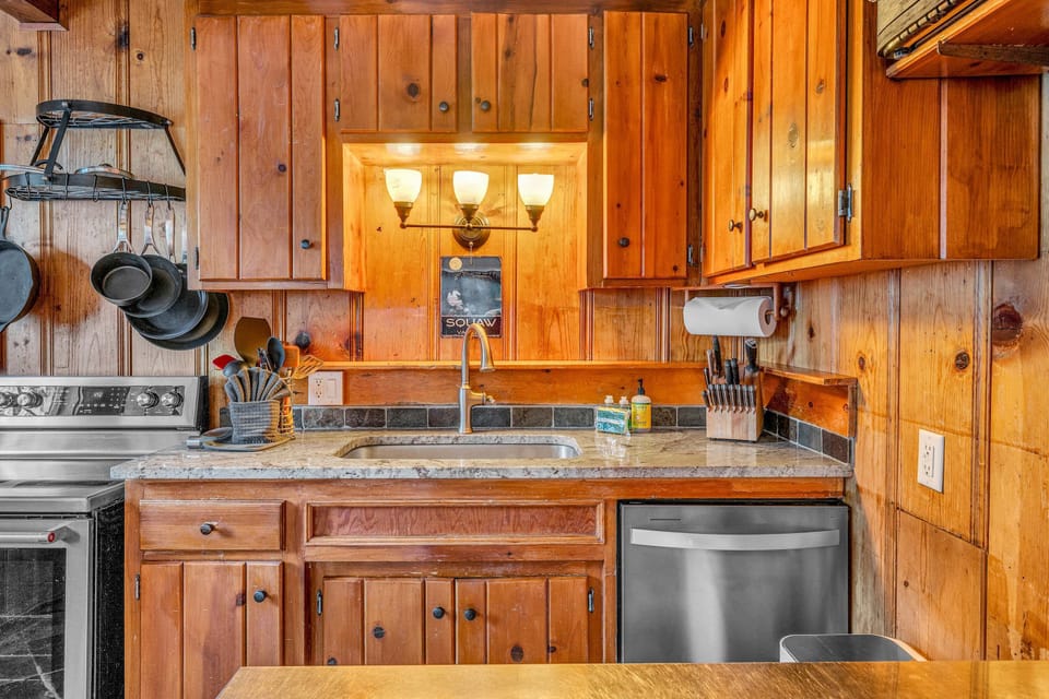 Kitchen: Drip coffee maker, Crockpot, air fryer, waffle maker, cooking utensils, tableware