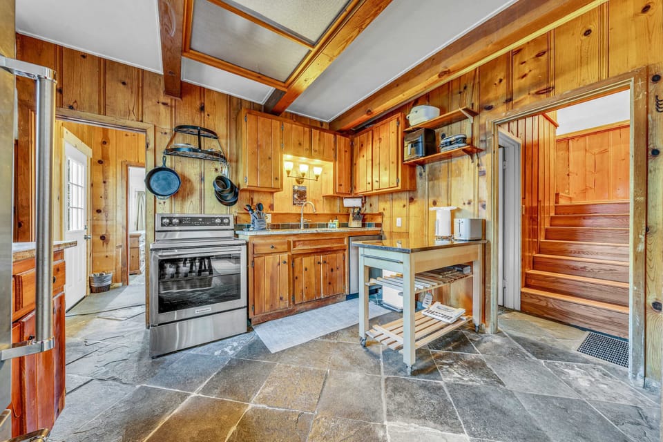 Kitchen: Drip coffee maker, Crockpot, air fryer, waffle maker, cooking utensils, tableware