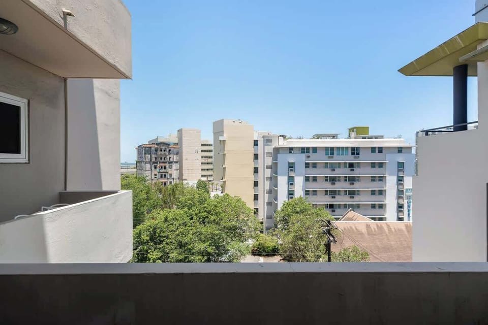 Private Balcony View. Enjoy fresh air and the urban vista of San Juan.