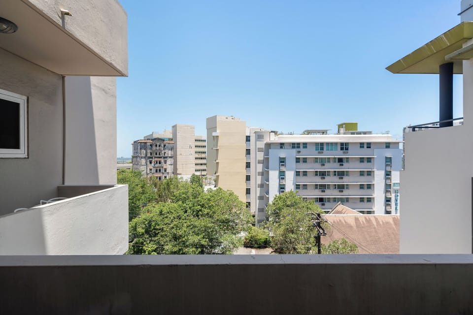 Private Balcony View. Enjoy fresh air and the urban vista of San Juan.