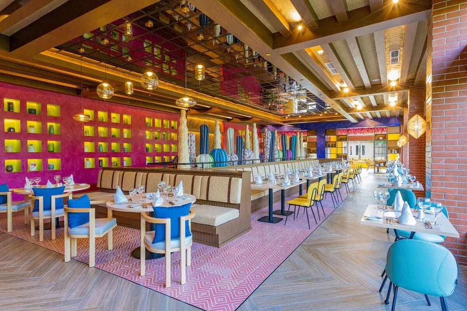 Gather for lively meals in this bold, design-forward dining room.