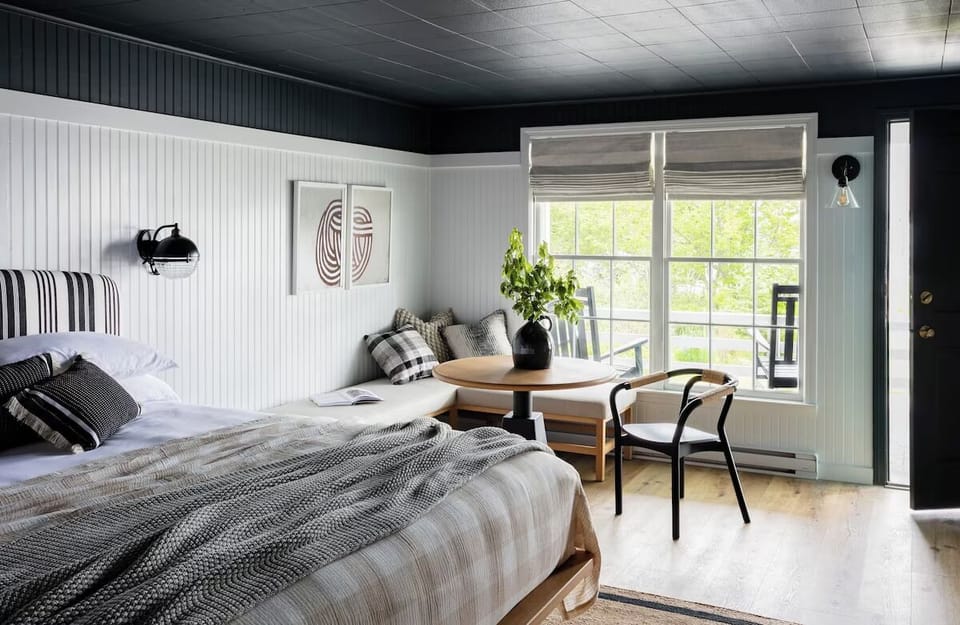 Stretch out in a sunlit suite with cozy seating.