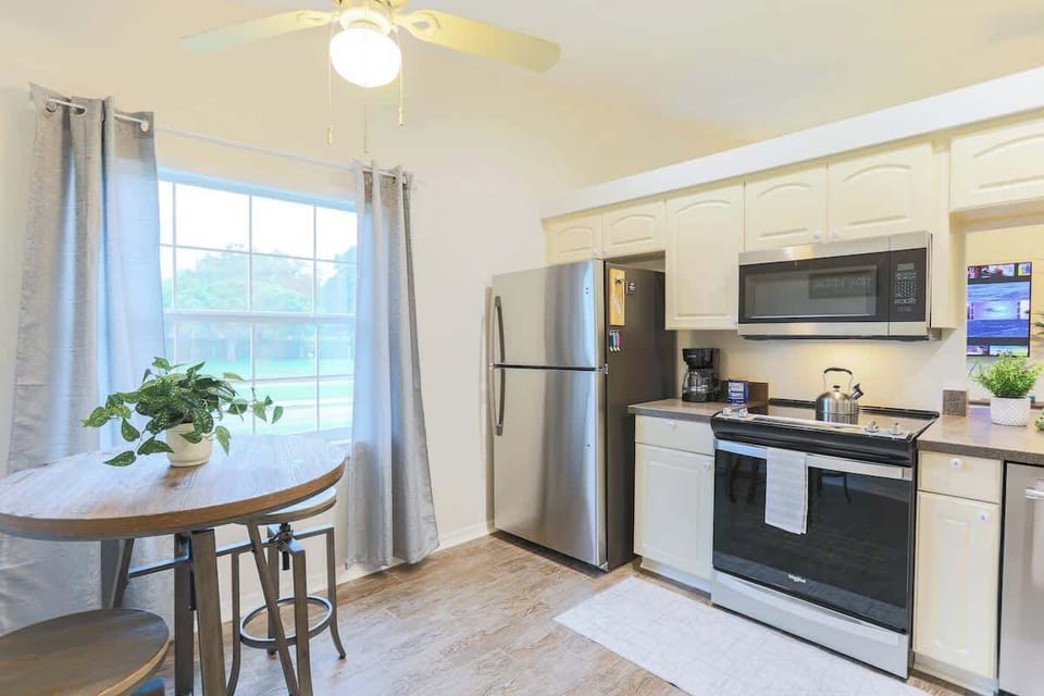 Enjoy a bright, open kitchen with ample counter space, sleek appliances, and a clean layout that makes meal prep a breeze.