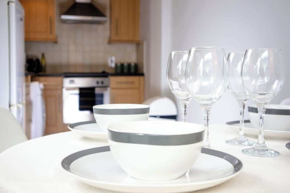 The dining area is a designated space for eating meals, typically featuring a table and seating.