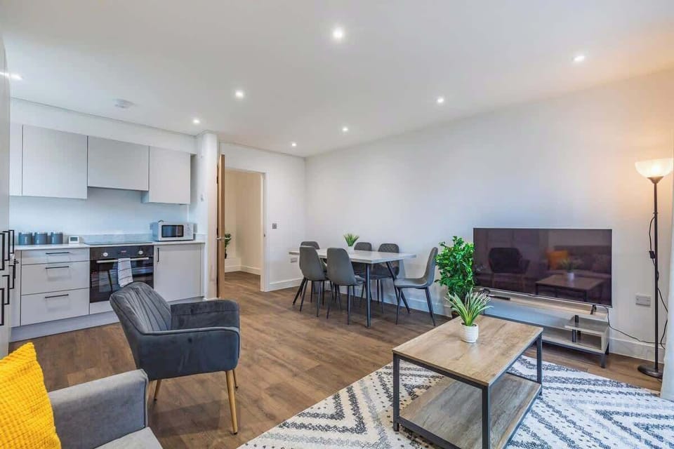 A cozy, inviting space designed for relaxation and socializing, featuring comfortable seating and tasteful decor.