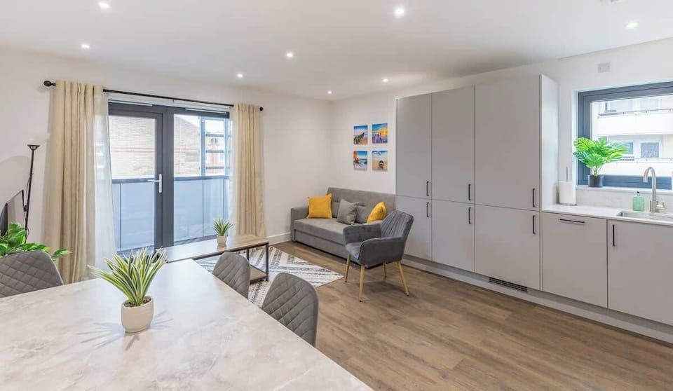 A cozy, inviting space designed for relaxation and socializing, featuring comfortable seating and tasteful decor.