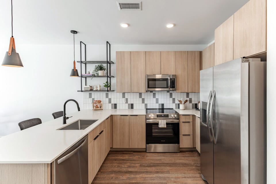 Prep easy meals in the sleek, fully equipped kitchen.