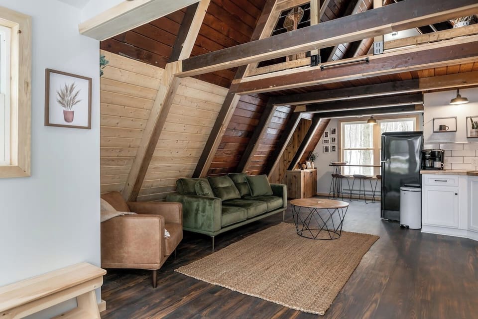 Sitting Area with couch, chair and table. 