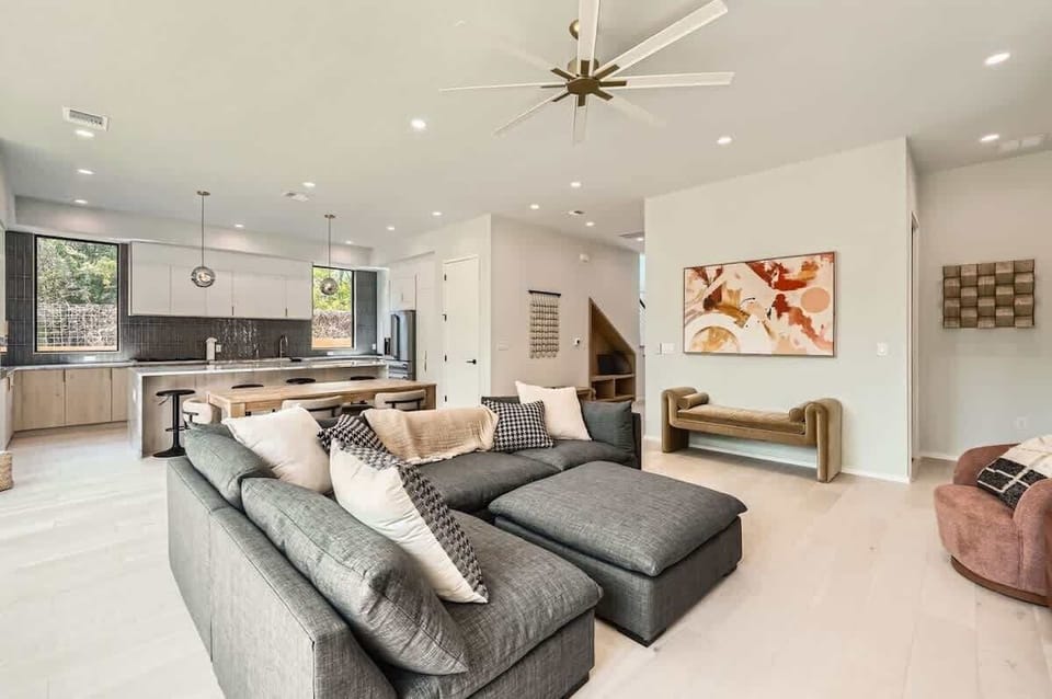 Open-concept with seamless flow to the kitchen and dining areas.