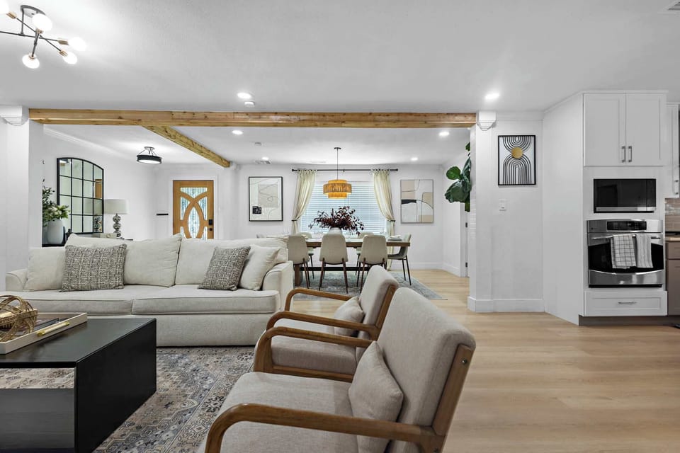 Relax in our living room area with comfy sofa and chairs.