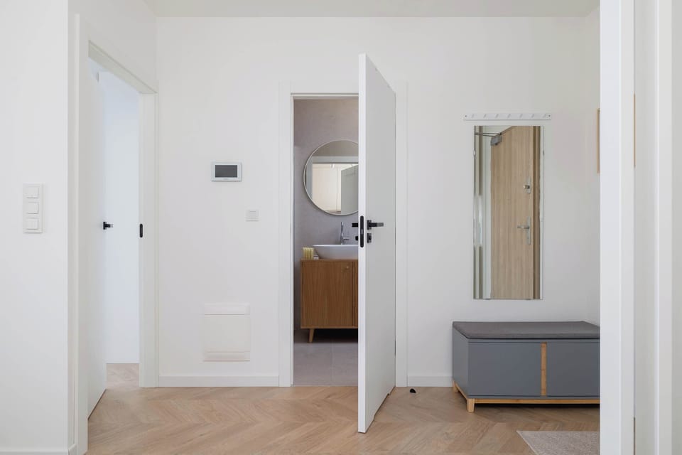 Hallway with a mirror.
